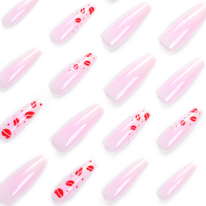 Kunstvolle Stiletto-Nägel mit Lippenmotiven Brehn