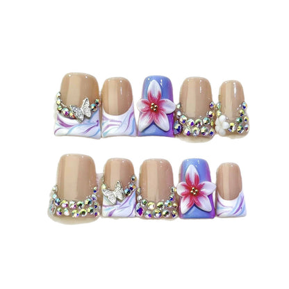 Dekoratives florales Nagelkunstset mit Strassteinen