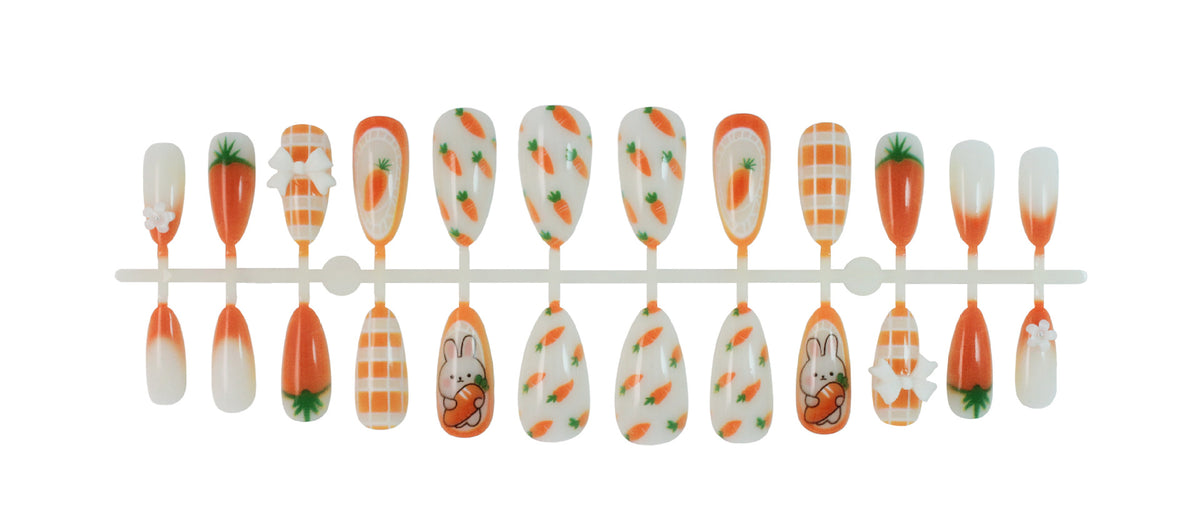 Kunstnagelset mit frühlingshaften Karotten- und Hasenmuster Brehn