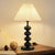 Dekorative Tischlampe mit plissiertem Schirm