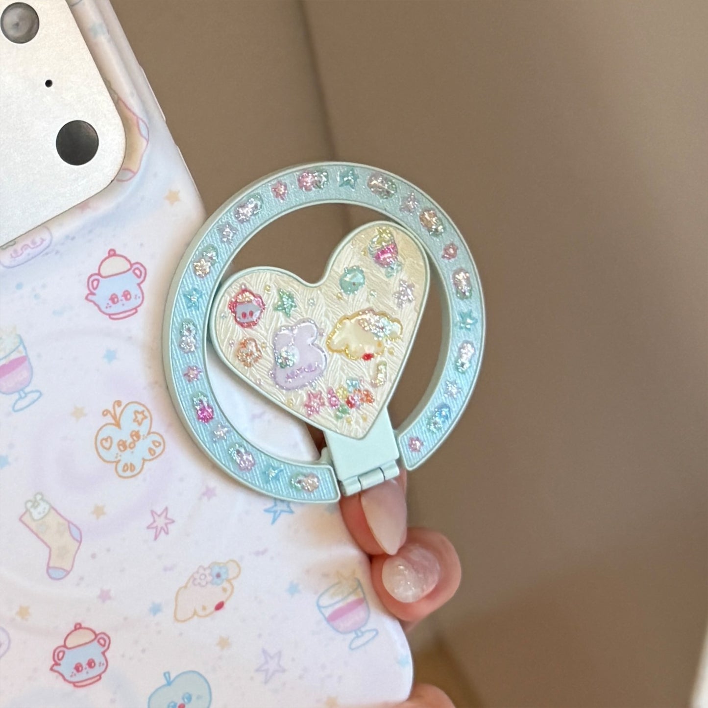 Herzförmiger Smartphone Fingerhalter Brehn