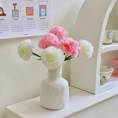 Dekoratives Blumenmittelstück für Tischdekoration