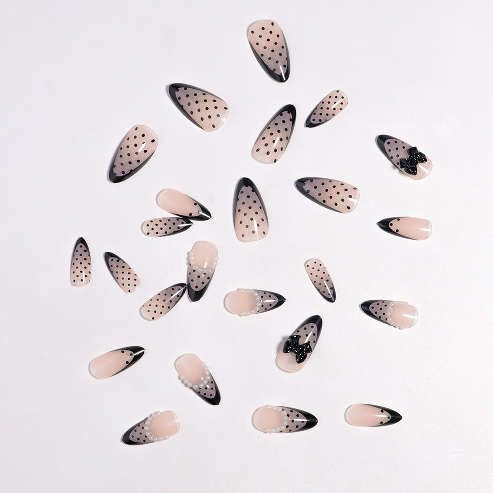 Elegante Polka Dot Drucknägel mit Schleifenakzenten Brehn