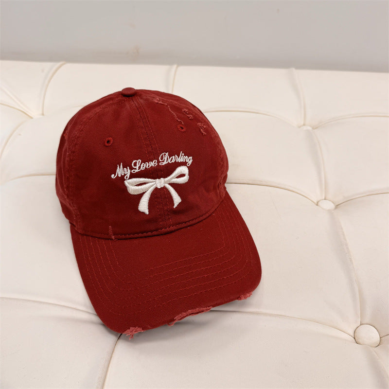 Damen Distressed Baumwoll-Baseballmütze mit Schleifenstickerei Brehn