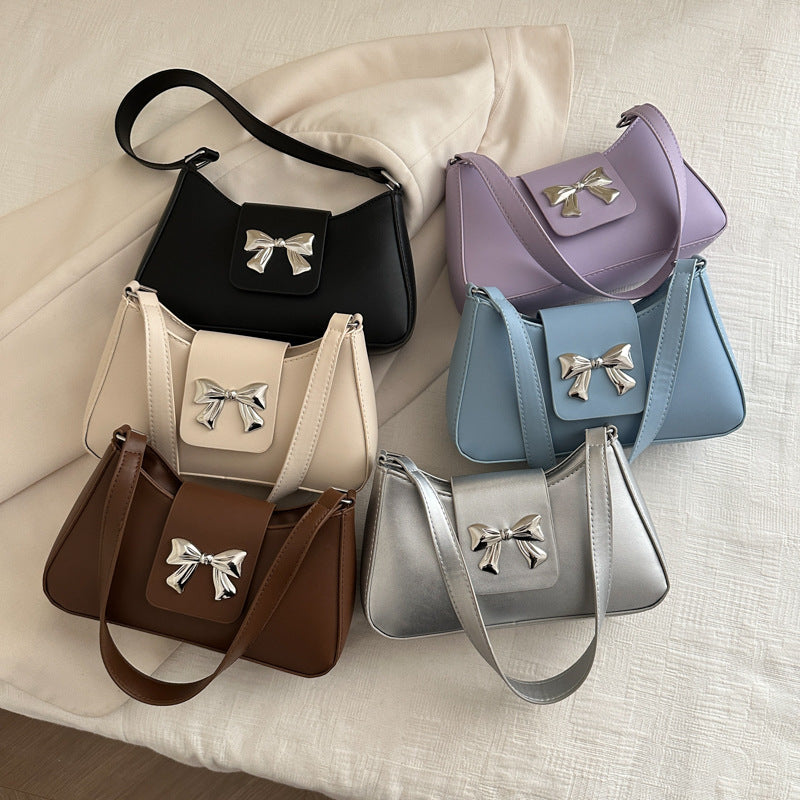Stylische Schleifenakzent-Handtasche Brehn