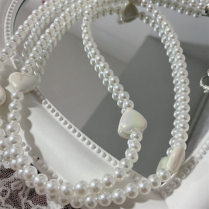 Eleganter Perlenbesetzter Brillenhalter Brehn