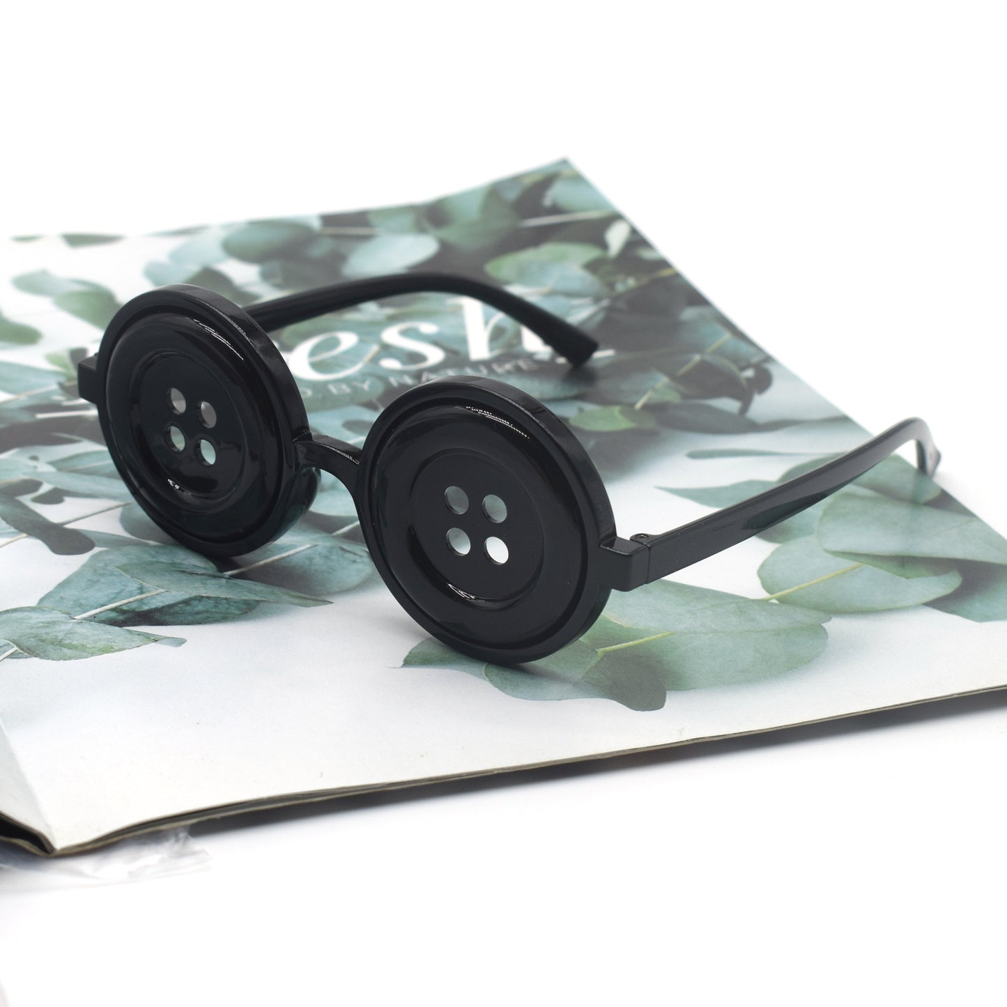 Einzigartiges Knopfdesign Brille Brehn