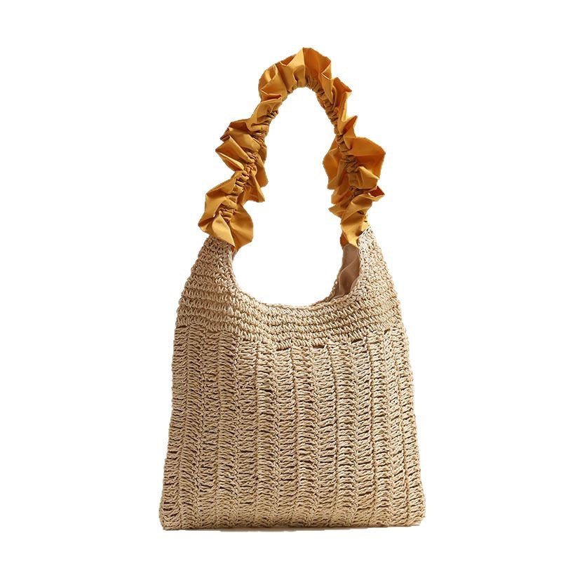 Elegante Handtasche mit Rüschenverziertem Griff Brehn
