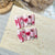 Künstlerisches Press-On Nail Set mit verspielten Herz- und Palmendesigns Brehn