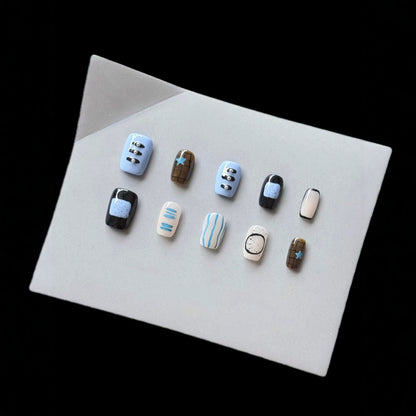 Künstlerisches Press-On Nagelkunst Set mit modernen geometrischen Mustern