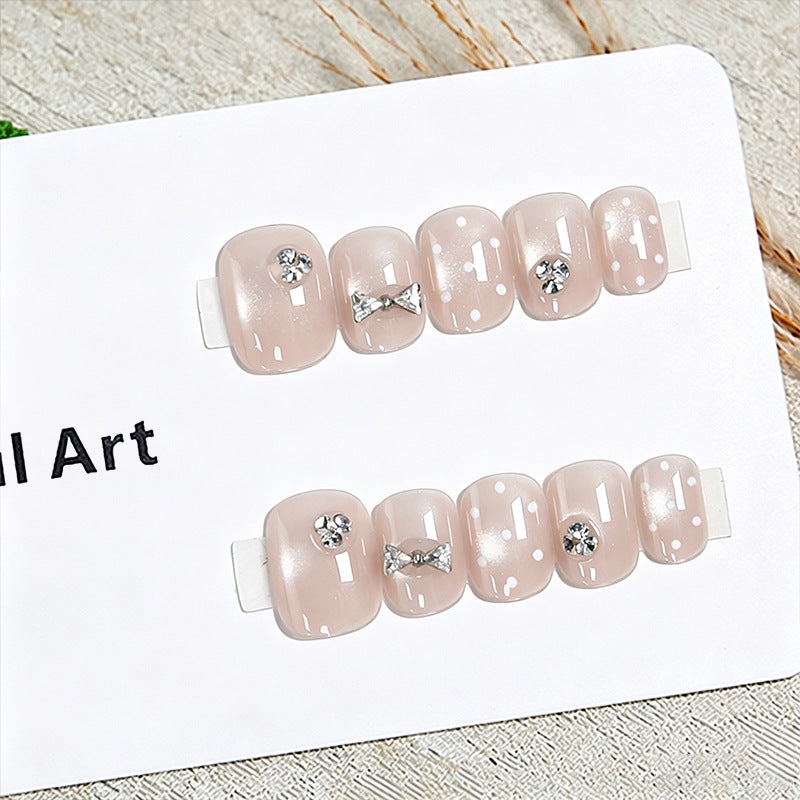Kunstnagelset mit eleganten Glitzer- und Kristallverzierungen Brehn
