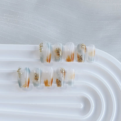 Dekoratives Press-On Nagelkunst-Set mit Farbverlauf und Glitzerakzenten