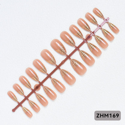 Elegante Press-On Nagelspitzen mit goldenen Details Brehn