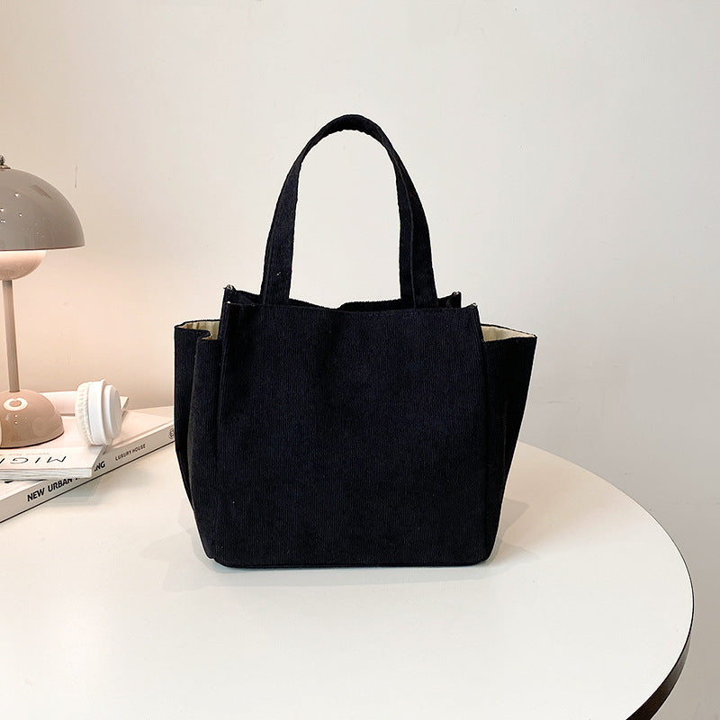 Texturierte Cordura-Tote-Tasche mit niedlichem Plüsch-Anhänger