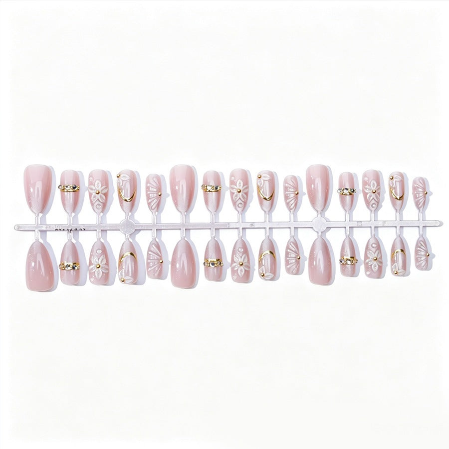 Elegantes Kunstnagelset mit Blumen- und Glitzerelementen Brehn