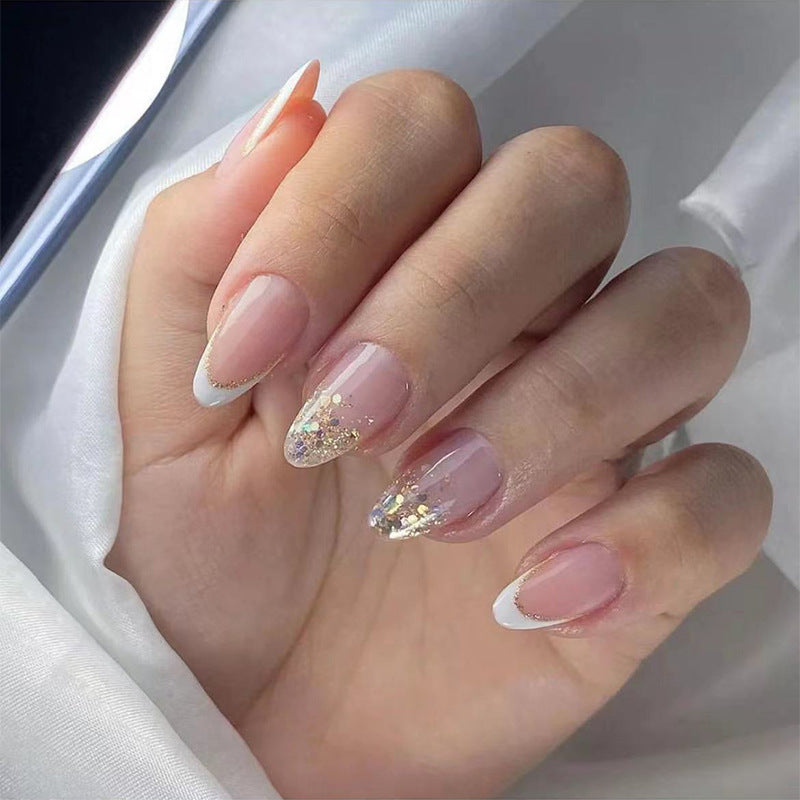 Elegantes Stiletto Press-On Nail Set mit Glitzer und französischer Spitze Brehn
