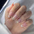 Elegantes Stiletto Press-On Nail Set mit Glitzer und französischer Spitze Brehn