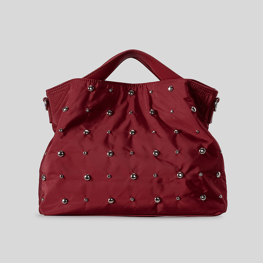 Modebewusste gesteppte Handtasche