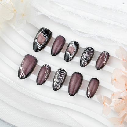 Dekorativer Stiletto Press-On Nagelset Brehn