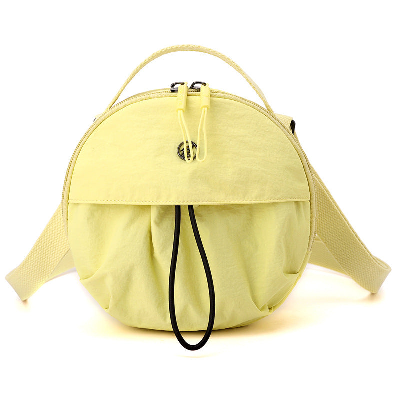 Runde Crossbody-Tasche Brehn