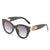 Modische Cat-Eye-Sonnenbrille mit dekorativen Akzenten Brehn
