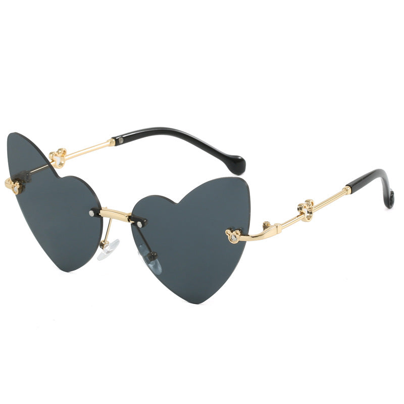 Damen Herzförmige Sonnenbrille mit verziertem Rahmen Brehn