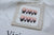 Künstlerisches Press-On Nagel Set mit floralem Design Brehn