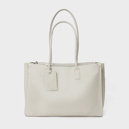 Glattes veganes Leder strukturiert Top-Zip Tote mit doppelten gerollten Griffen und Gepäckanhänger