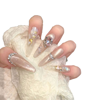 Dekoratives Stiletto Press-On Nagelkunstset mit Edelsteinakzenten Brehn