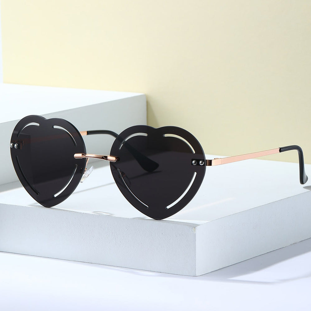 Damen Herzförmige Sonnenbrille mit stylischem Metallrahmen Brehn