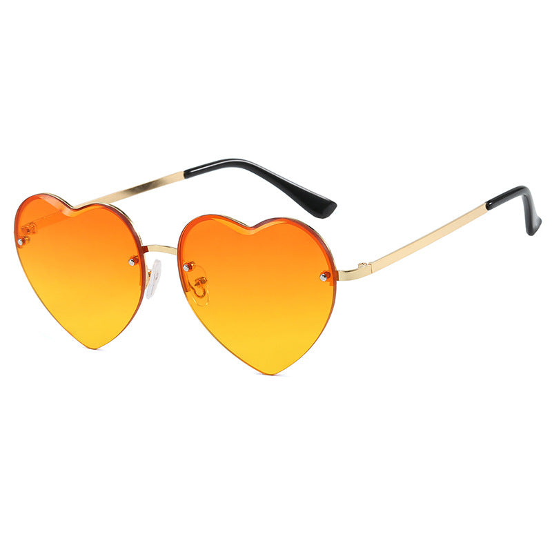 Damen Herzförmige Sonnenbrille mit verspiegelten Gläsern und modischem Metallrahmen Brehn