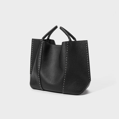 Geprägte Leder-Zwei-Henkel-Snap-Top-Tote mit Kontraststichdetails