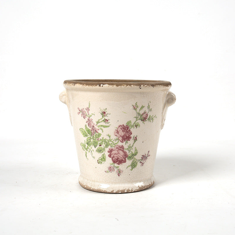 Dekorativer Blumentopf mit floralen Verzierungen Brehn