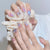 Kunstnagelset mit Glitzer- und 3D-Schmetterlingsverzierungen Brehn