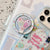 Herzförmiger Smartphone Fingerhalter mit Kawaii Design Brehn