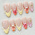 Beeindruckendes florales Design Press-On Nagelset Brehn