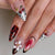 Künstlerisches Press-On Nagelset mit floralen und Musterdesigns Brehn