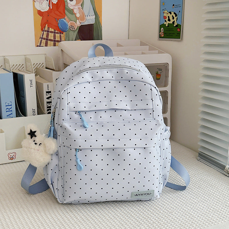 Verspielter gepunkteter Rucksack