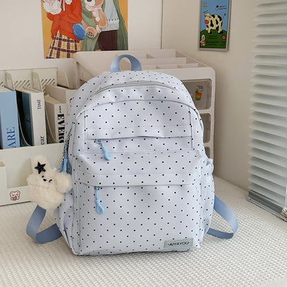 Verspielter gepunkteter Rucksack