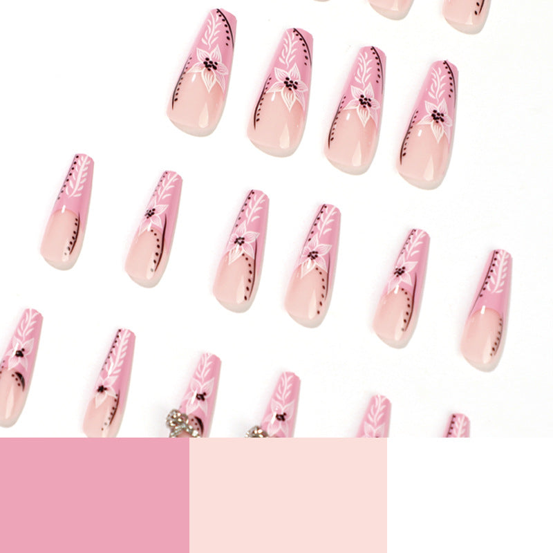 Kunstvolle Nagelkunst mit Blumen- und Herzmotiven Brehn