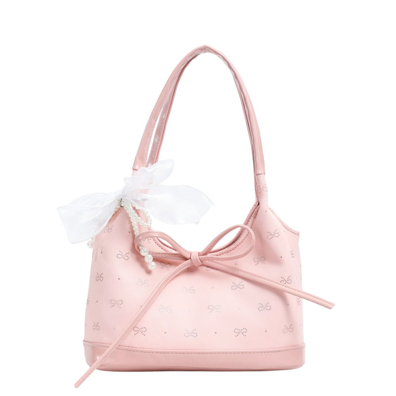 Schleifenverzierter Handtasche