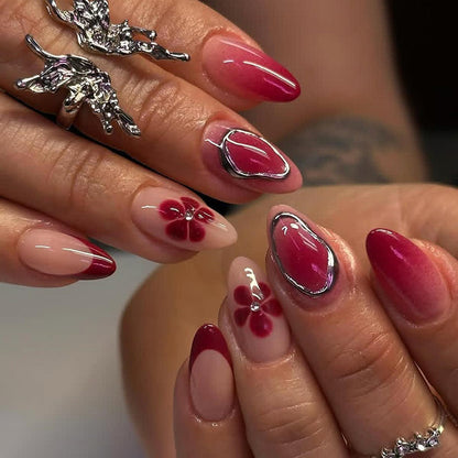Kunstnagelset mit eleganten Blüten- und Ombre-Akzenten Brehn