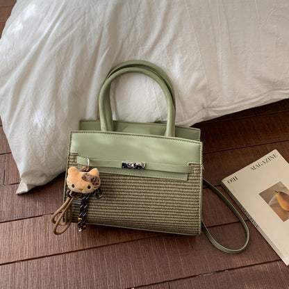 Elegante gewebte Handtasche mit abnehmbarem Schulterriemen