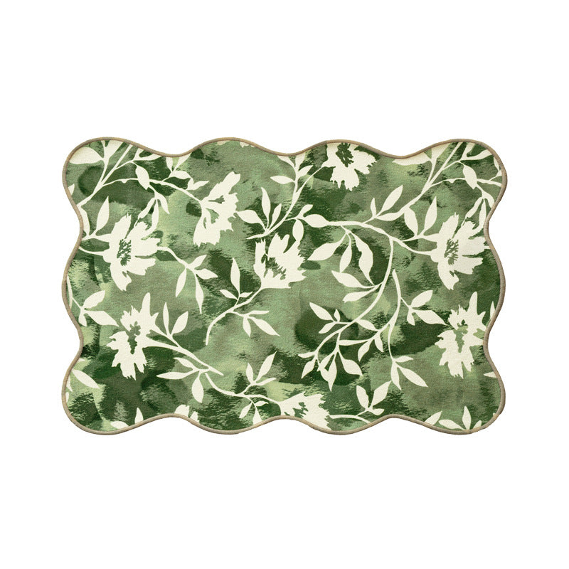 Dekorativer Kurzflor-Teppich mit gewelltem Rand und floralem Aquarellmuster Brehn