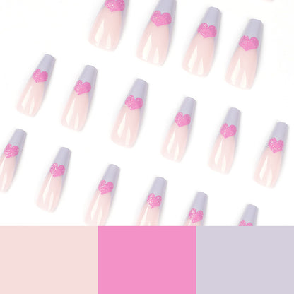 Kunstvolle Stiletto-Nägel mit bunten Herzmotiven Brehn