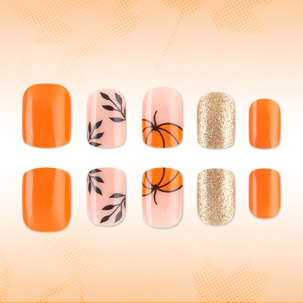 Dekorativer Press-On Nagelkunst-Set mit Kürbisdesign Brehn