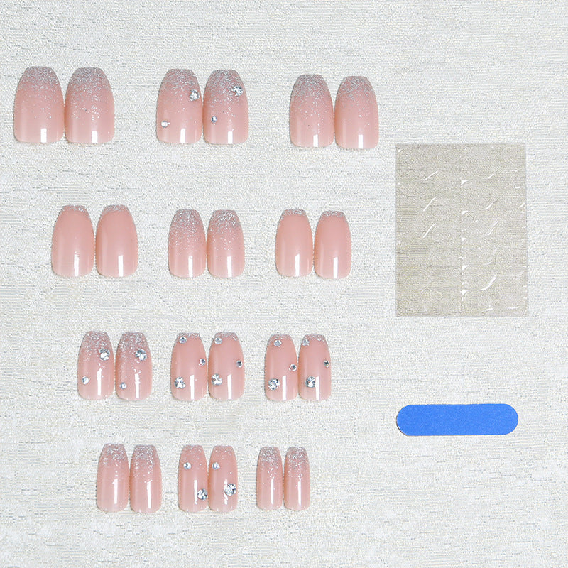 Kunstnagelset mit extravaganten Glitzer- und Kristallverzierungen Brehn
