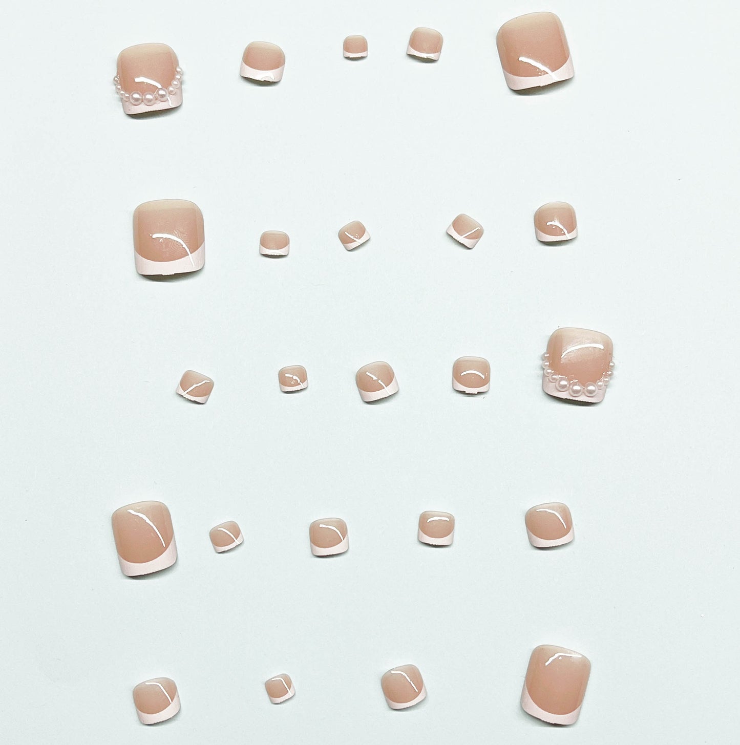 Kunstnagelset für Fußnägel mit eleganten Spitzenverzierungen Brehn