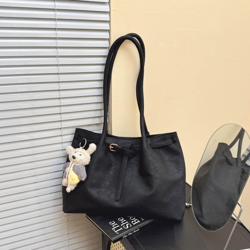Elegante Handtasche mit floralem Muster