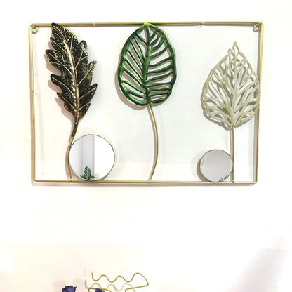 Dekorative Metallwandkunst mit tropischem Blatt- und Spiegeldesign Brehn